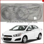 Стекло фары Chevrolet Aveo T300 2012- левое.