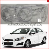 Стекло фары Chevrolet Aveo T300 2012- левое.